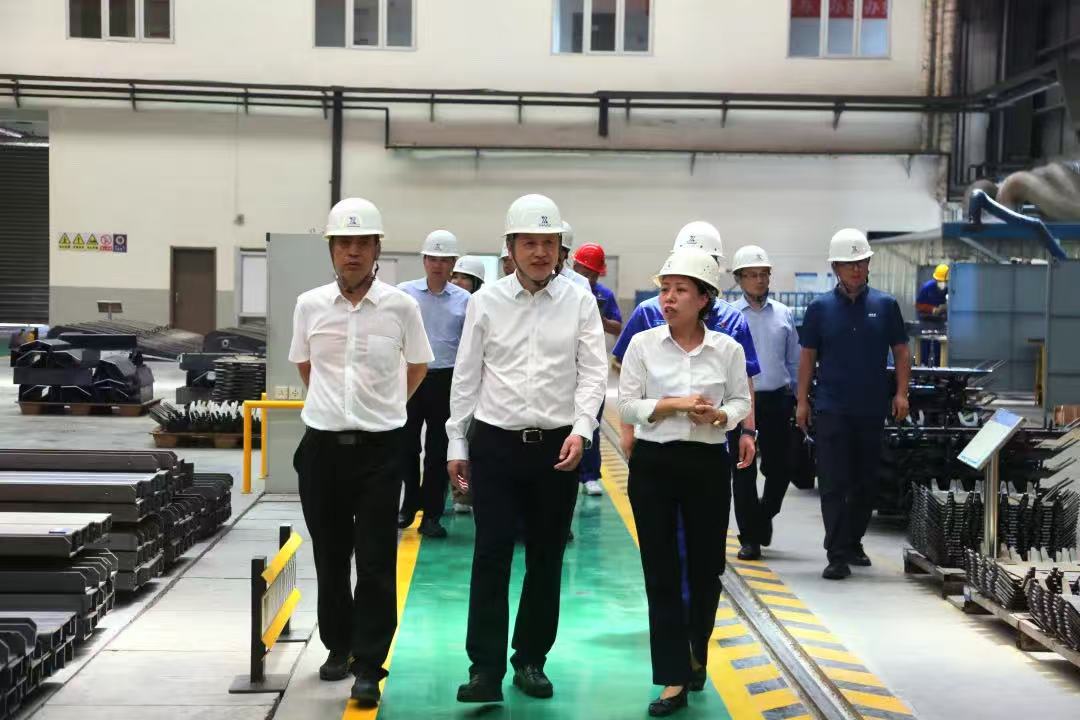 周群到北京三兴汽车公司调研
