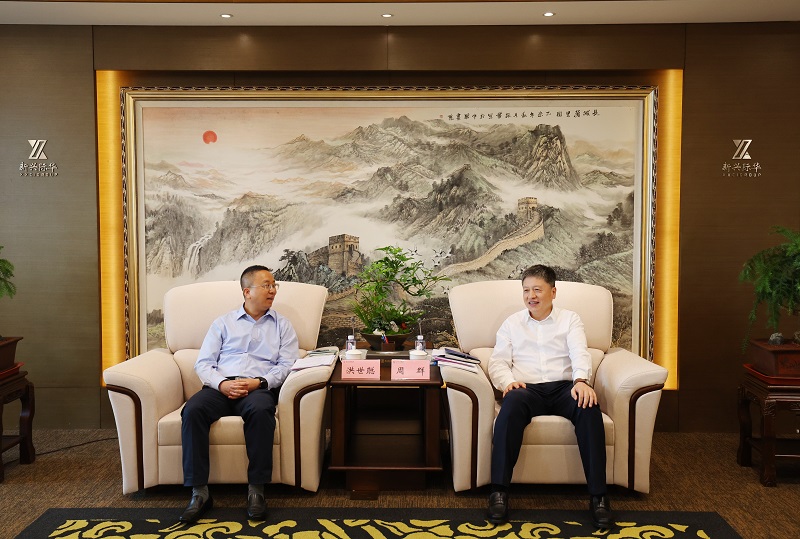 周群会见天津经开区党委书记、管委会主任洪世聪